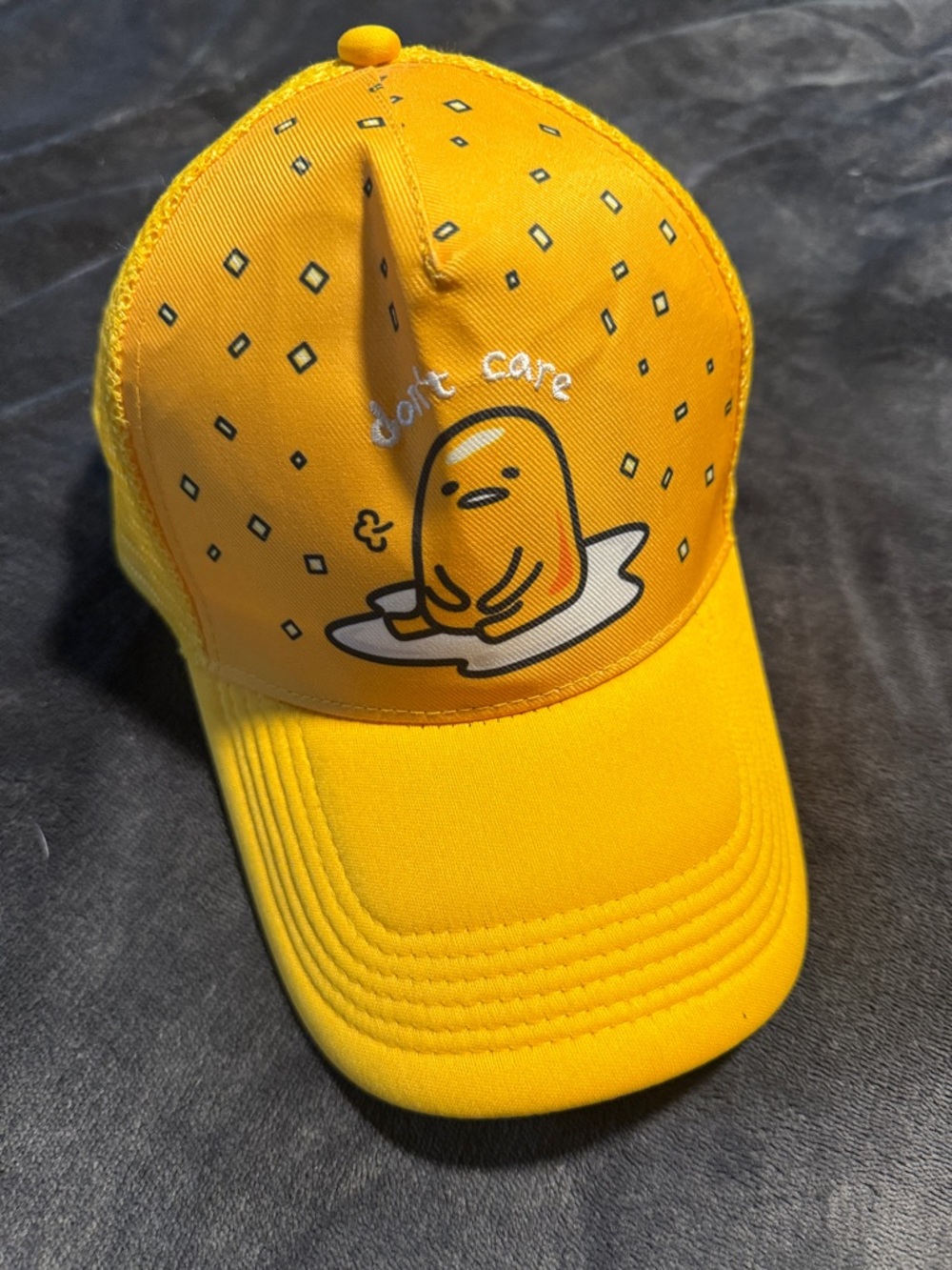 Gudetama Yellow Graphic Trucker Hat - "Don't Care"